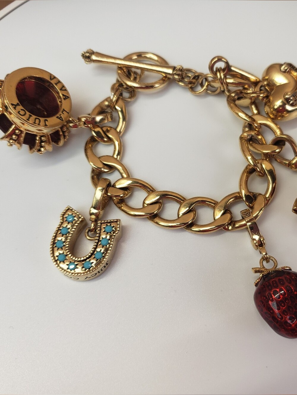 Juicy Couture Gold Tone Charm Bracelet Crown Strawberry Trophy Heart Horseshoe
